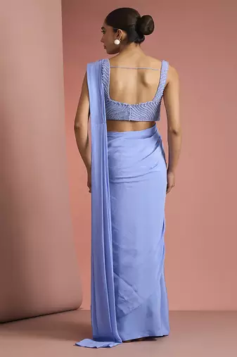 Blue crepe drape saree with pearl work blouse