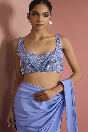 Blue crepe drape saree with pearl work blouse