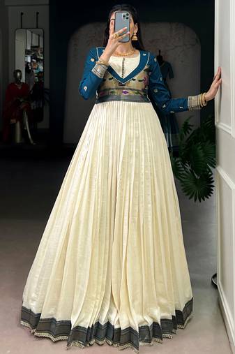 Graceful Off-White Zari Weaving Silk Festival Wear Gown