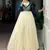 Graceful Off-White Zari Weaving Silk Festival Wear Gown