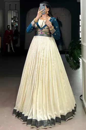 Graceful Off-White Zari Weaving Silk Festival Wear Gown
