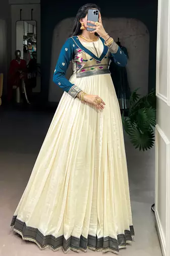 Graceful Off-White Zari Weaving Silk Festival Wear Gown