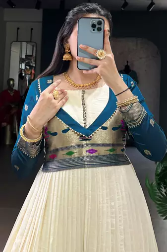 Graceful Off-White Zari Weaving Silk Festival Wear Gown