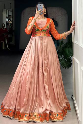 Captivating Peach Zari Weaving Silk Function Wear Gown