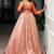 Captivating Peach Zari Weaving Silk Function Wear Gown