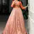 Captivating Peach Zari Weaving Silk Function Wear Gown