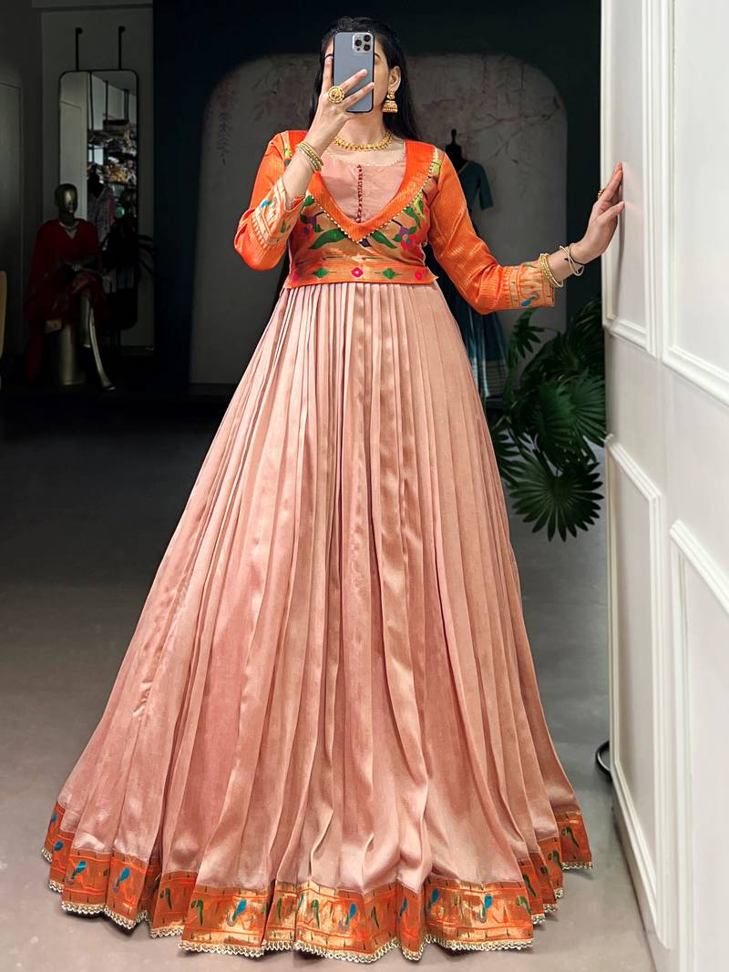 Captivating Peach Zari Weaving Silk Function Wear Gown