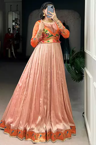 Captivating Peach Zari Weaving Silk Function Wear Gown