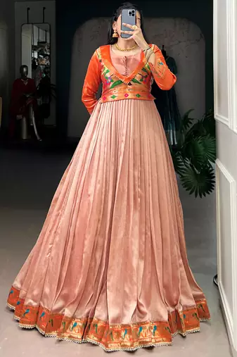 Captivating Peach Zari Weaving Silk Function Wear Gown