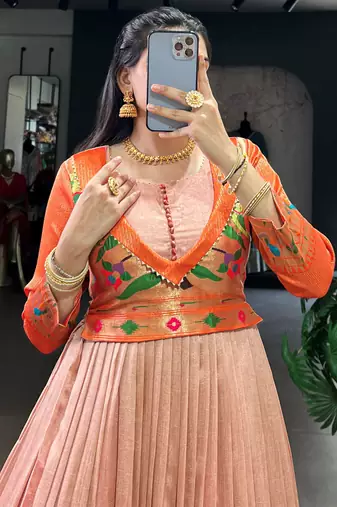 Captivating Peach Zari Weaving Silk Function Wear Gown