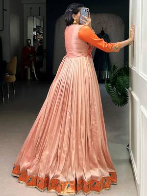 Captivating Peach Zari Weaving Silk Function Wear Gown 6