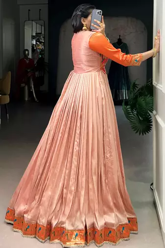 Captivating Peach Zari Weaving Silk Function Wear Gown