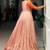 Captivating Peach Zari Weaving Silk Function Wear Gown