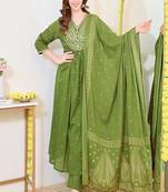 green floral embroidered  cotton kurta with trouser and dupatta