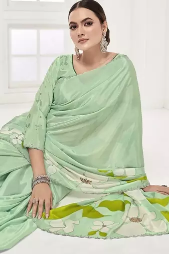 emerald light green  printed saree with blouse or saraowski border