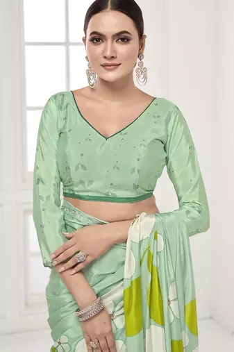emerald light green  printed saree with blouse or saraowski border
