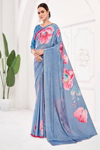 Blue premium printed saree with blouse or saraowski border