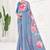 Blue premium printed saree with blouse or saraowski border