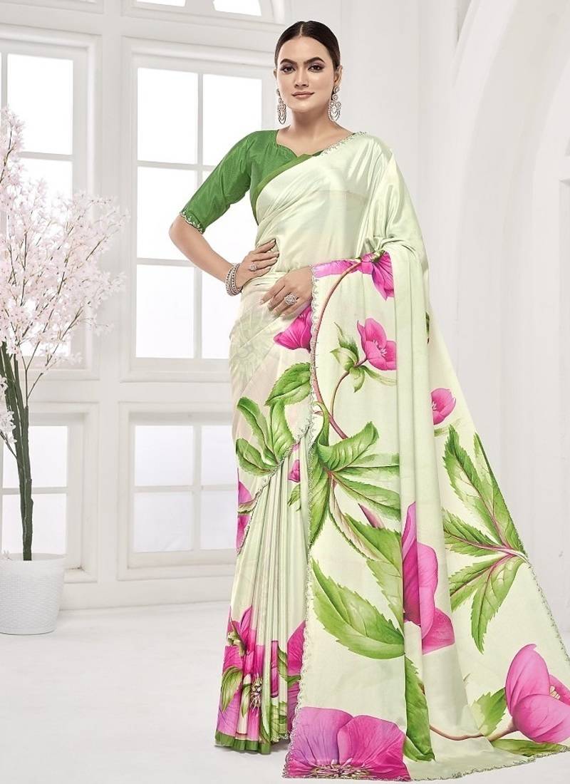 pistachio green  premium printed saree with blouse or saraowski border