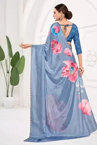 Blue  printed saree with blouse or saraowski border