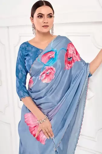 Blue  printed saree with blouse or saraowski border