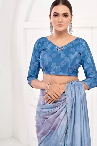 Blue  printed saree with blouse or saraowski border