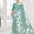 turqoise light blue  printed saree with blouse or saraowski border