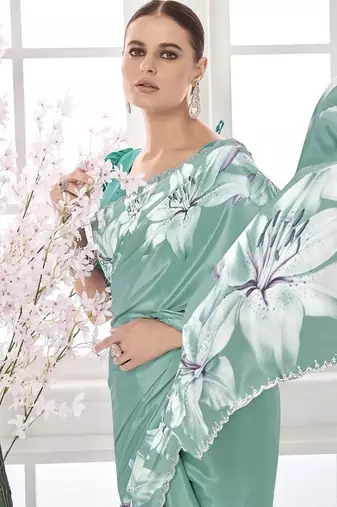 turqoise light blue  printed saree with blouse or saraowski border