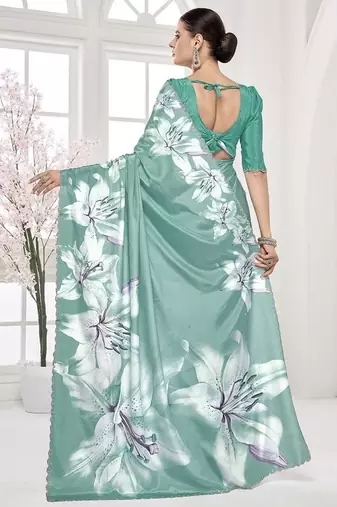 turqoise light blue  printed saree with blouse or saraowski border
