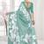turqoise light blue  premium printed saree with blouse or saraowski border