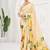 Yellow  premium printed saree with blouse or saraowski border