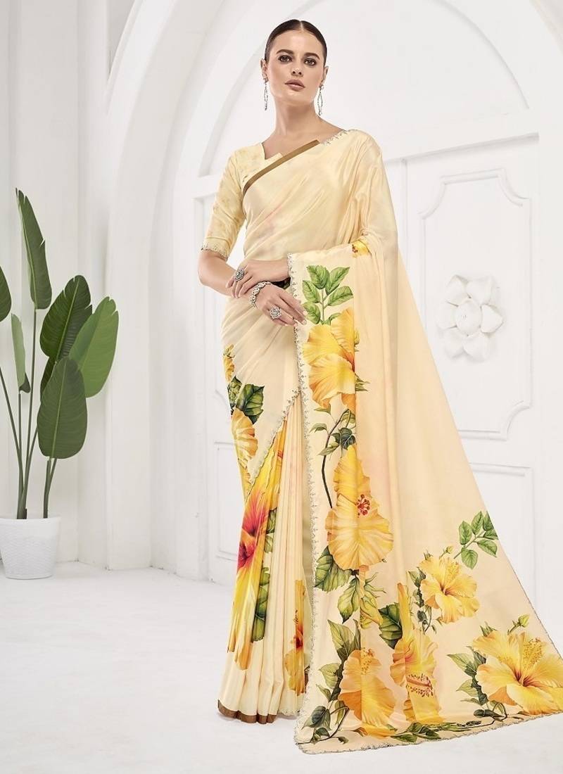 Yellow  premium printed saree with blouse or saraowski border