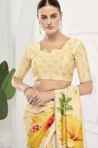 Yellow  printed saree with blouse or saraowski border