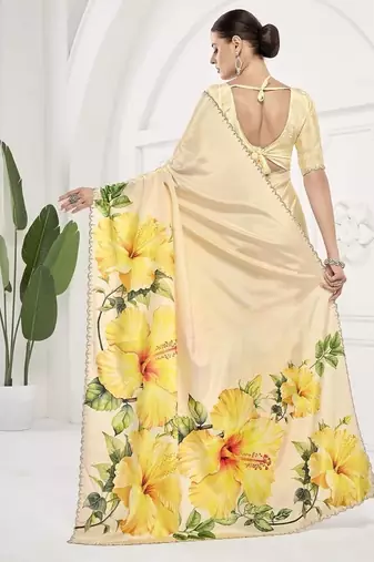 Yellow  printed saree with blouse or saraowski border