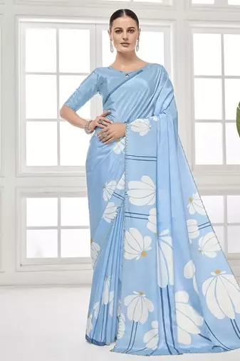sky blue  premium printed saree with blouse or saraowski border