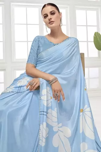 sky blue  printed saree with blouse or saraowski border