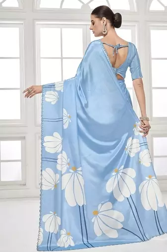 sky blue  printed saree with blouse or saraowski border