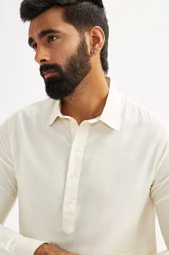 cream solid cotton pathani kurta with shirt collar and full sleeves
