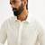 cream solid cotton pathani kurta with shirt collar and full sleeves