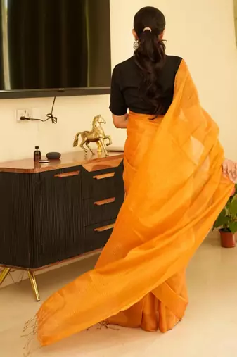 sunlit saffron handwoven mustard yellow tissue linen saree