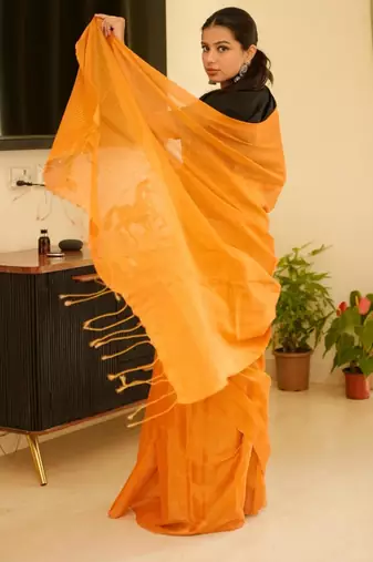 sunlit saffron handwoven mustard yellow tissue linen saree