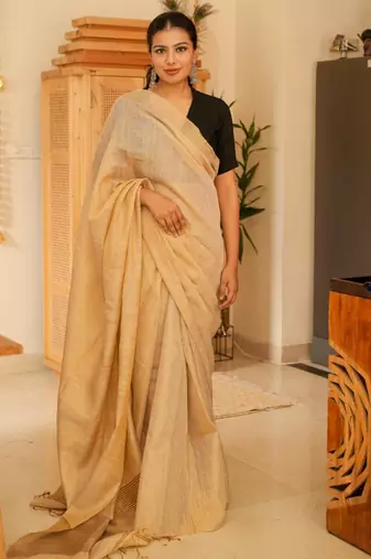 sunehri handwoven beige-gold tissue linen saree with subtle zari highlights