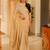 sunehri handwoven beige-gold tissue linen saree with subtle zari highlights