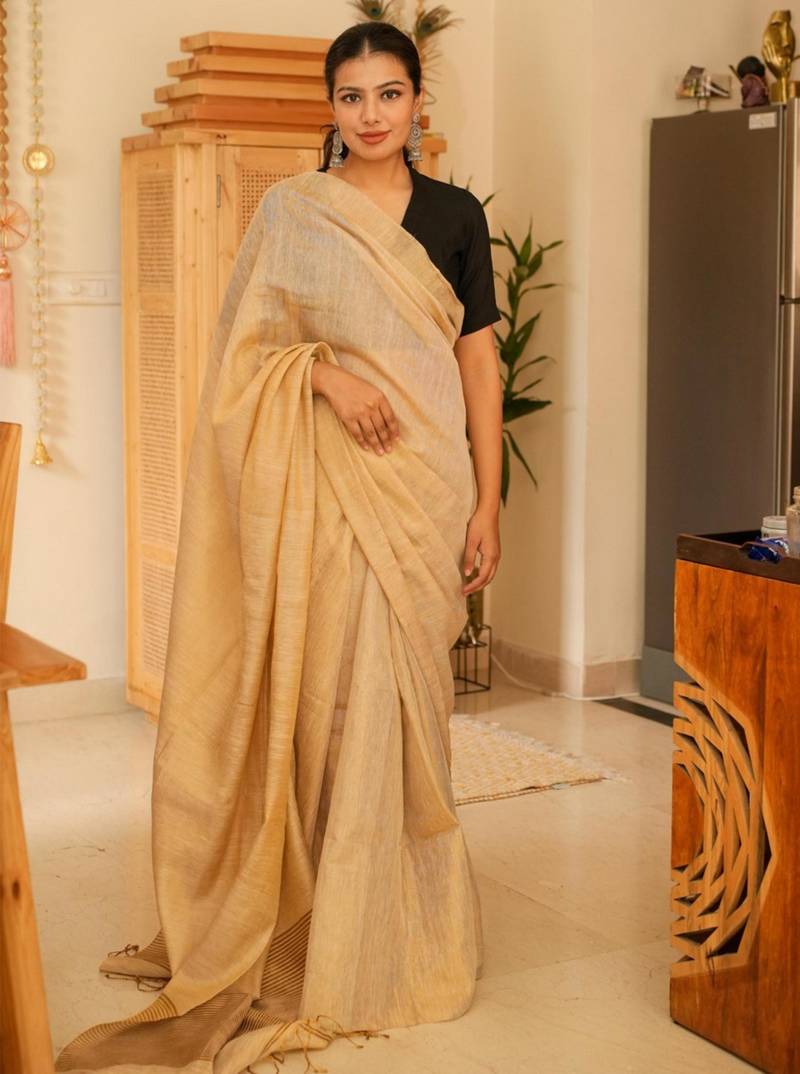 sunehri handwoven beige-gold tissue linen saree with subtle zari highlights