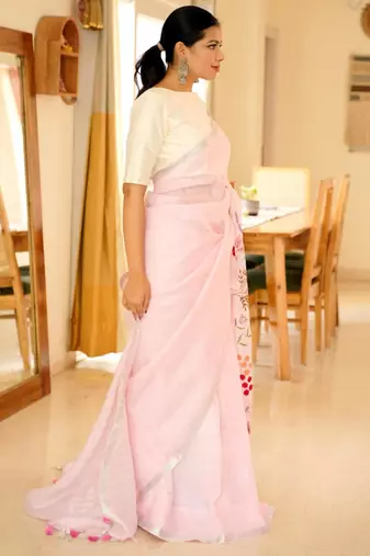 linen saree with elegant floral hand embroidery