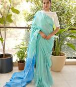 aqua blue linen saree with hand embroidered floral motifs