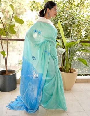 aqua blue linen saree with hand embroidered floral motifs 3