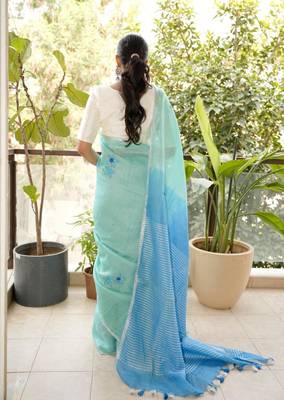 aqua blue linen saree with hand embroidered floral motifs 4