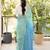 aqua blue linen saree with hand embroidered floral motifs