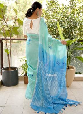 aqua blue linen saree with hand embroidered floral motifs 5